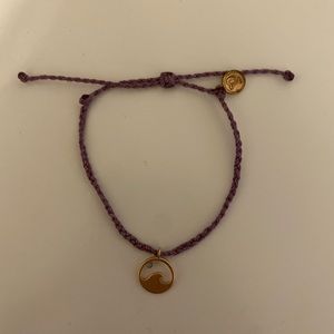 Purple Pura Vida bracelet with a rose gold wave and small gem stone moon